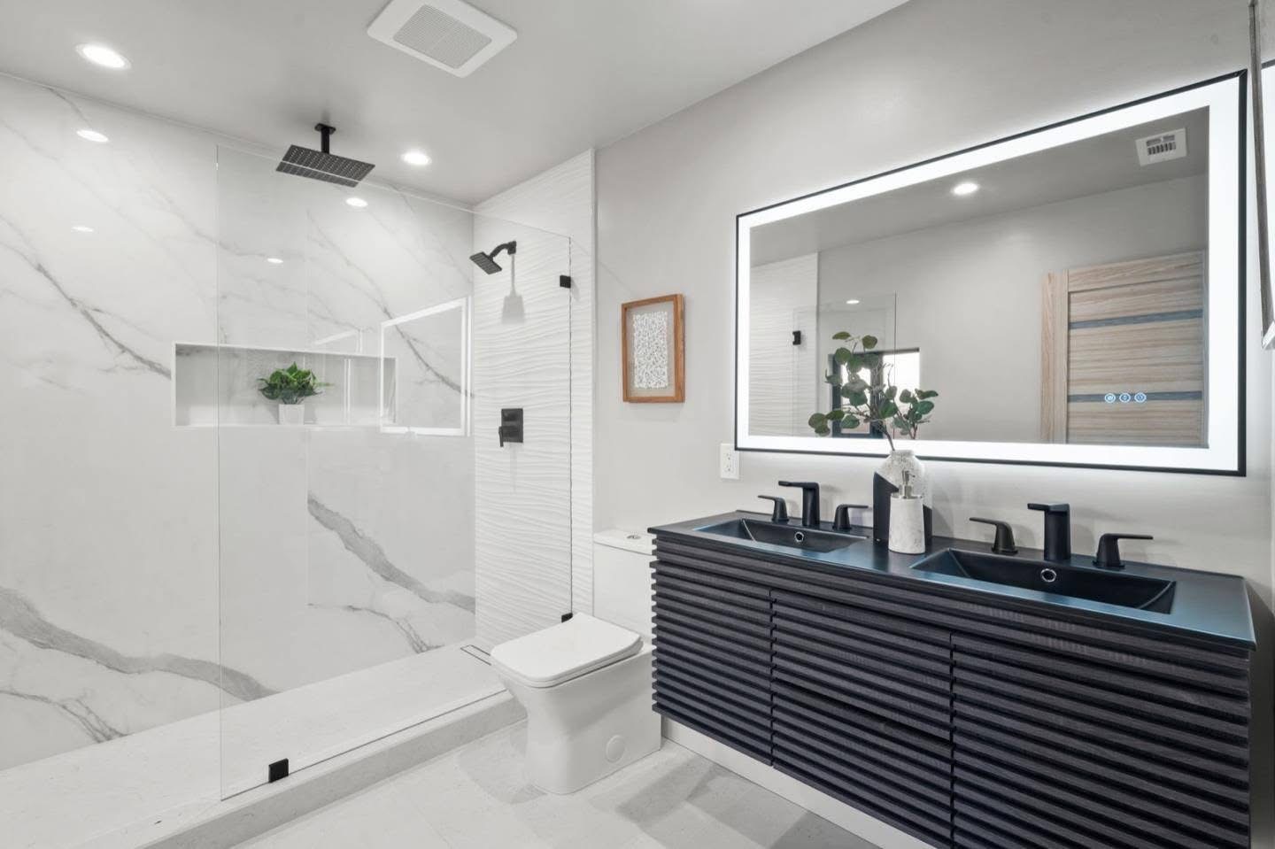 Modern Bathroom with Marble and Black Vanity